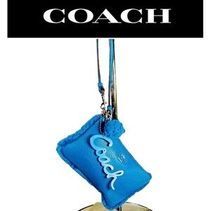 COACH Blue Shearling Pom Wristlet, EUC